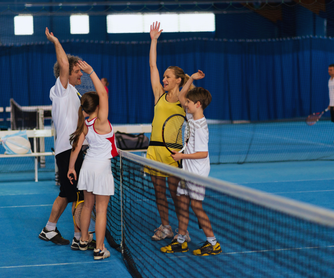 two families playing tennis